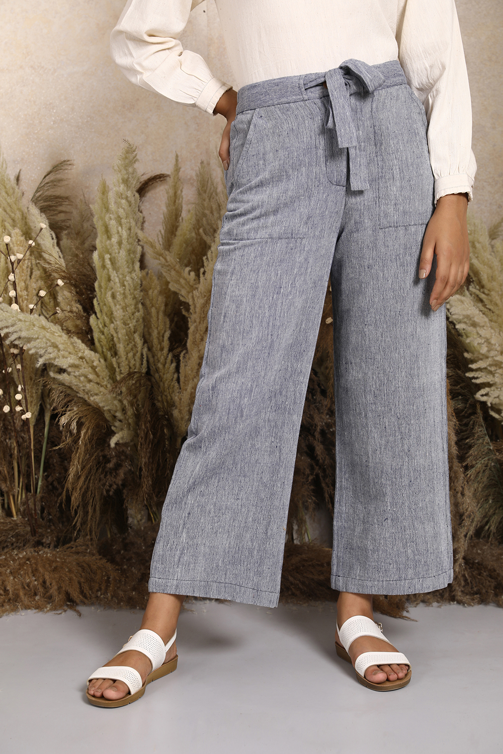 Handwoven Kala Cotton Tie-up Waist Wideleg Pants in Blue. Women's ankle length cotton pants by Vegan clothing brands India